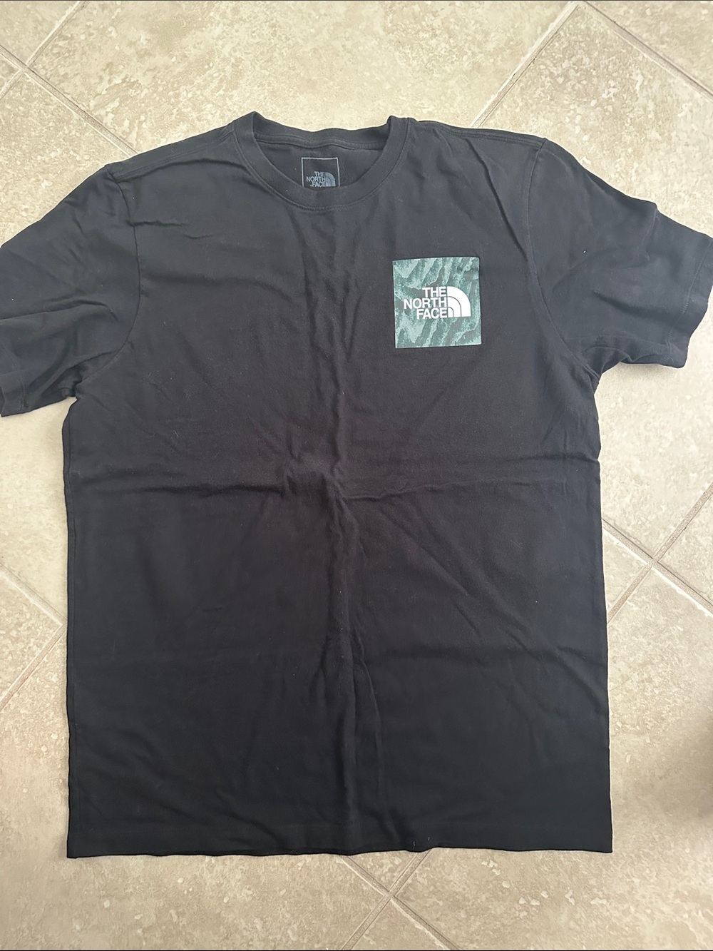 The North Face Black Short-Sleeve Tee with Green Logo Pocket